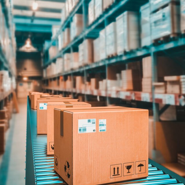 parcels on conveyor belt in a warehouse. 3d render.